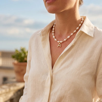 Premium baroque freshwater pearl and 14K gold filled beaded necklace with personalised gold bubble initial charm, hand-finished in Australia
