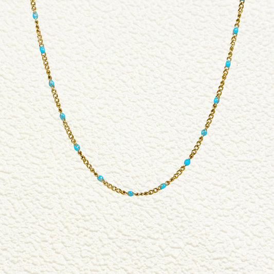 PVD gold stainless steel chain with blue enamel dot accents, versatile as necklace, bracelet, or anklet