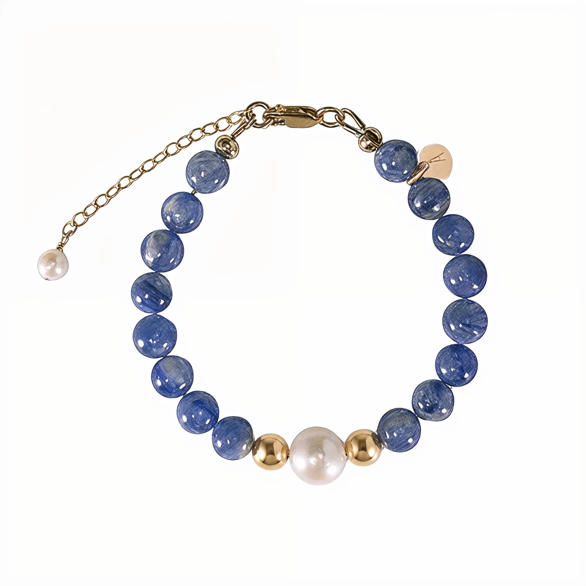 Blue kyanite, pearl and initial gold bracelet featuring Brazilian blue kyanite beads, lustrous freshwater pearls and a personalised gold-filled stamped initial disc.