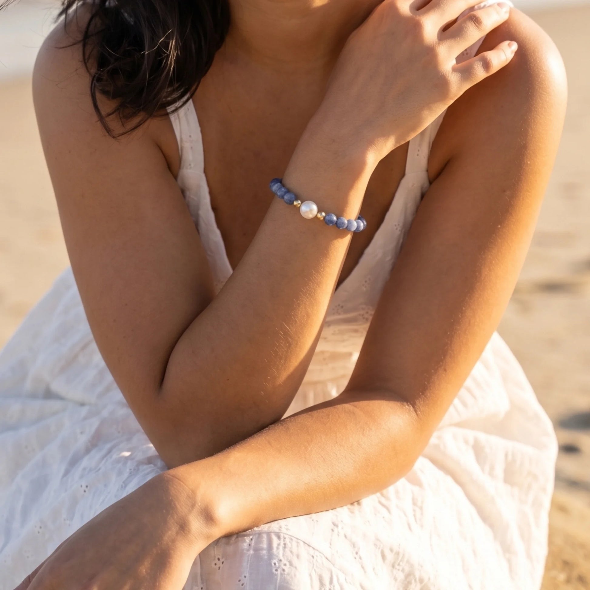 Blue kyanite, pearl and initial gold bracelet featuring Brazilian blue kyanite beads, lustrous freshwater pearls and a personalised gold-filled stamped initial disc.
