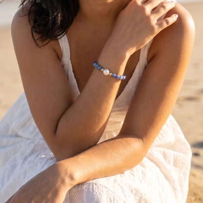 Blue kyanite, pearl and initial gold bracelet featuring Brazilian blue kyanite beads, lustrous freshwater pearls and a personalised gold-filled stamped initial disc.