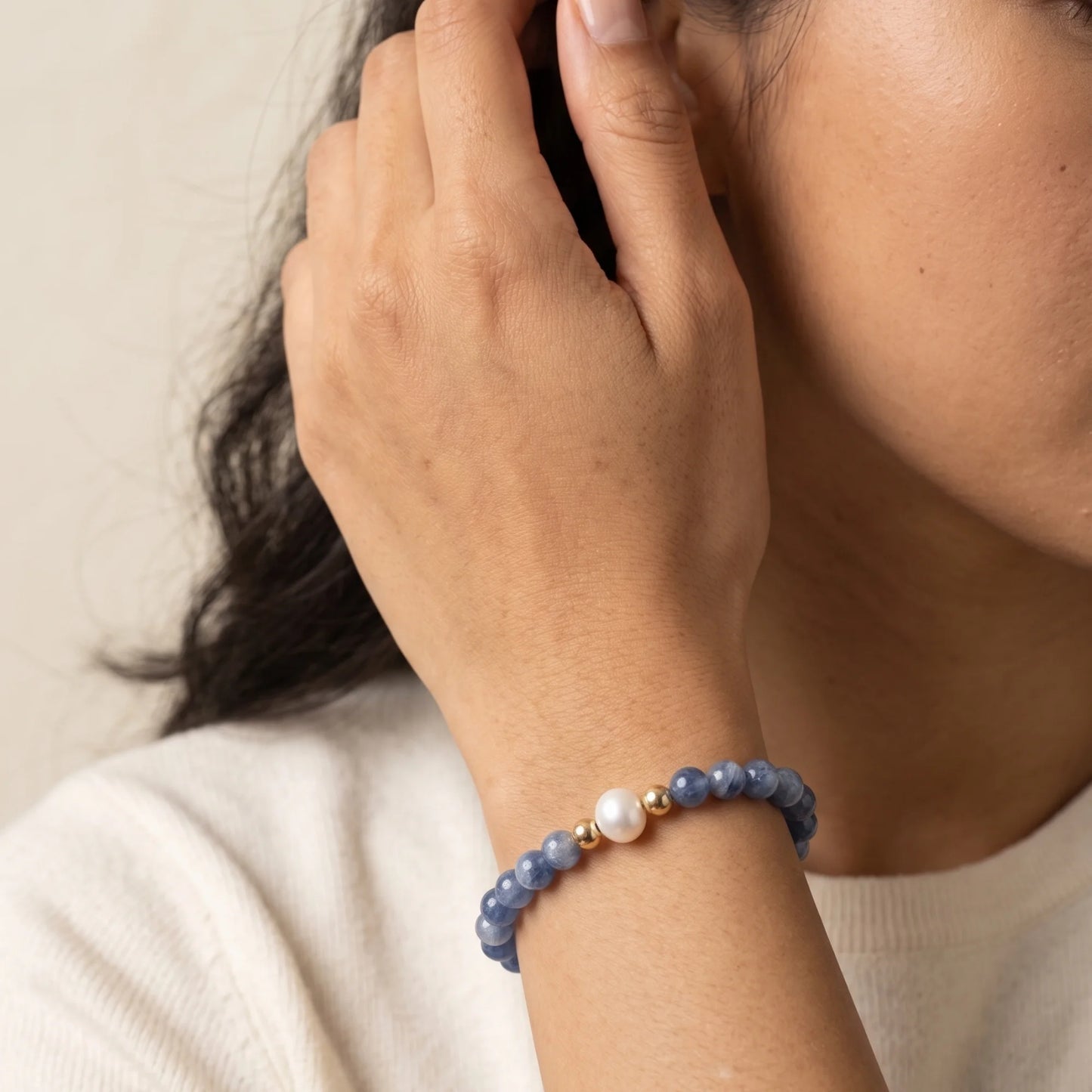 Blue kyanite, pearl and initial gold bracelet featuring Brazilian blue kyanite beads, lustrous freshwater pearls and a personalised gold-filled stamped initial disc.