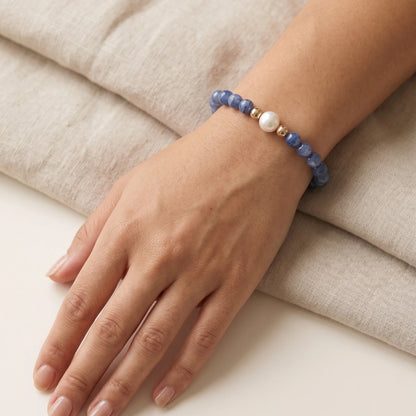 Blue kyanite, pearl and initial gold bracelet featuring Brazilian blue kyanite beads, lustrous freshwater pearls and a personalised gold-filled stamped initial disc.