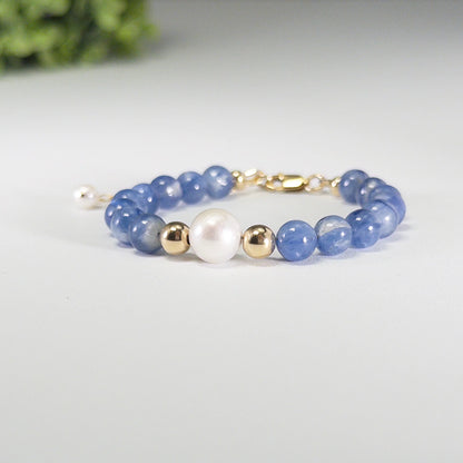 Blue kyanite, pearl and initial gold bracelet featuring Brazilian blue kyanite beads, lustrous freshwater pearls and a personalised gold-filled stamped initial disc.