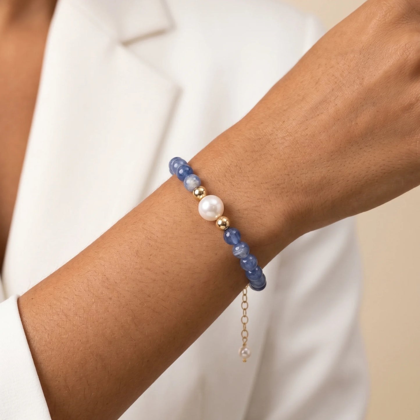 Blue kyanite, pearl and initial gold bracelet featuring Brazilian blue kyanite beads, lustrous freshwater pearls and a personalised gold-filled stamped initial disc.