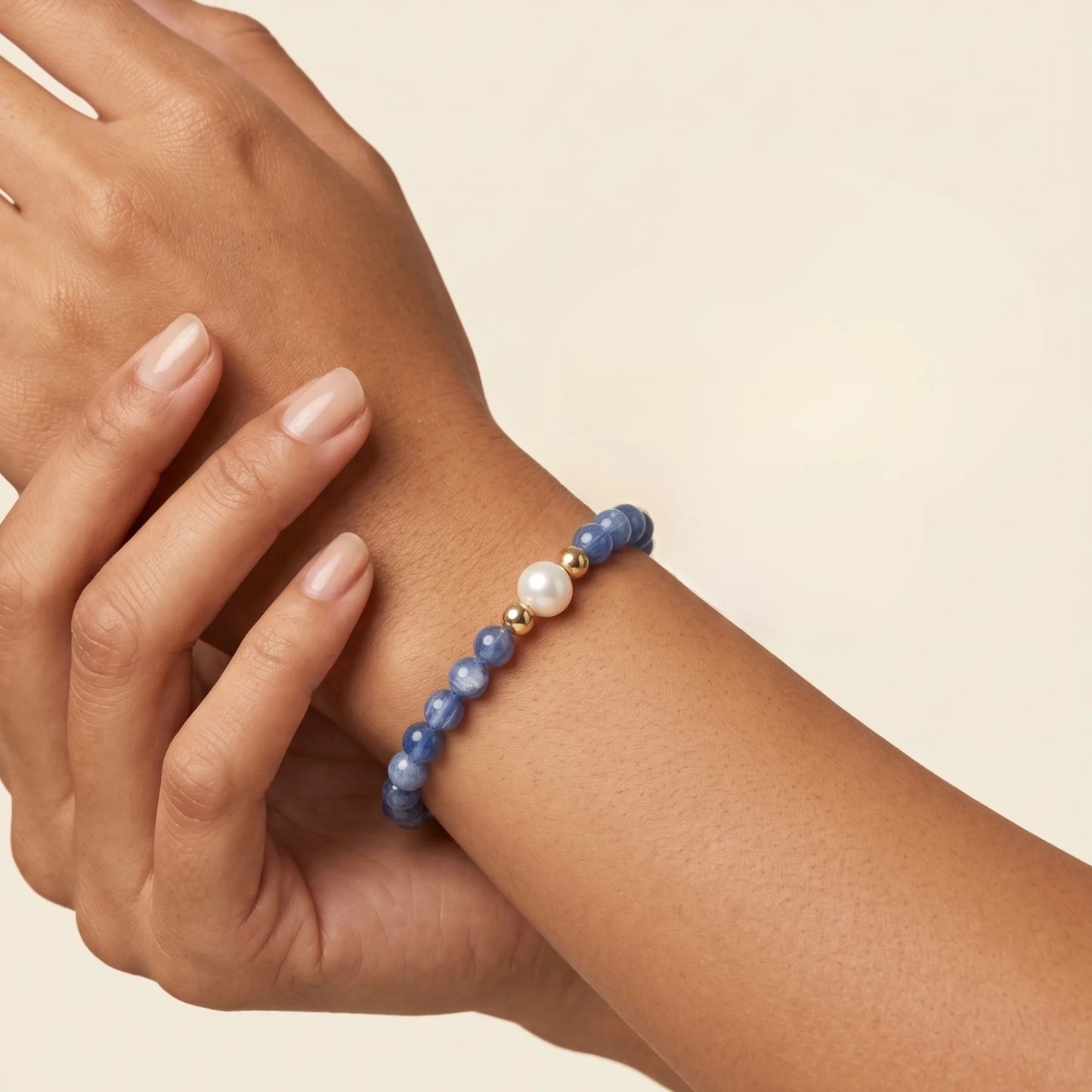 Blue kyanite, pearl and initial gold bracelet featuring Brazilian blue kyanite beads, lustrous freshwater pearls and a personalised gold-filled stamped initial disc.