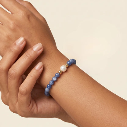 Blue kyanite, pearl and initial gold bracelet featuring Brazilian blue kyanite beads, lustrous freshwater pearls and a personalised gold-filled stamped initial disc.