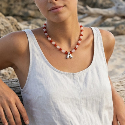 personalised necklace with alternating carnelian and pink morganite beads, silver spacers and bubble initial letter.