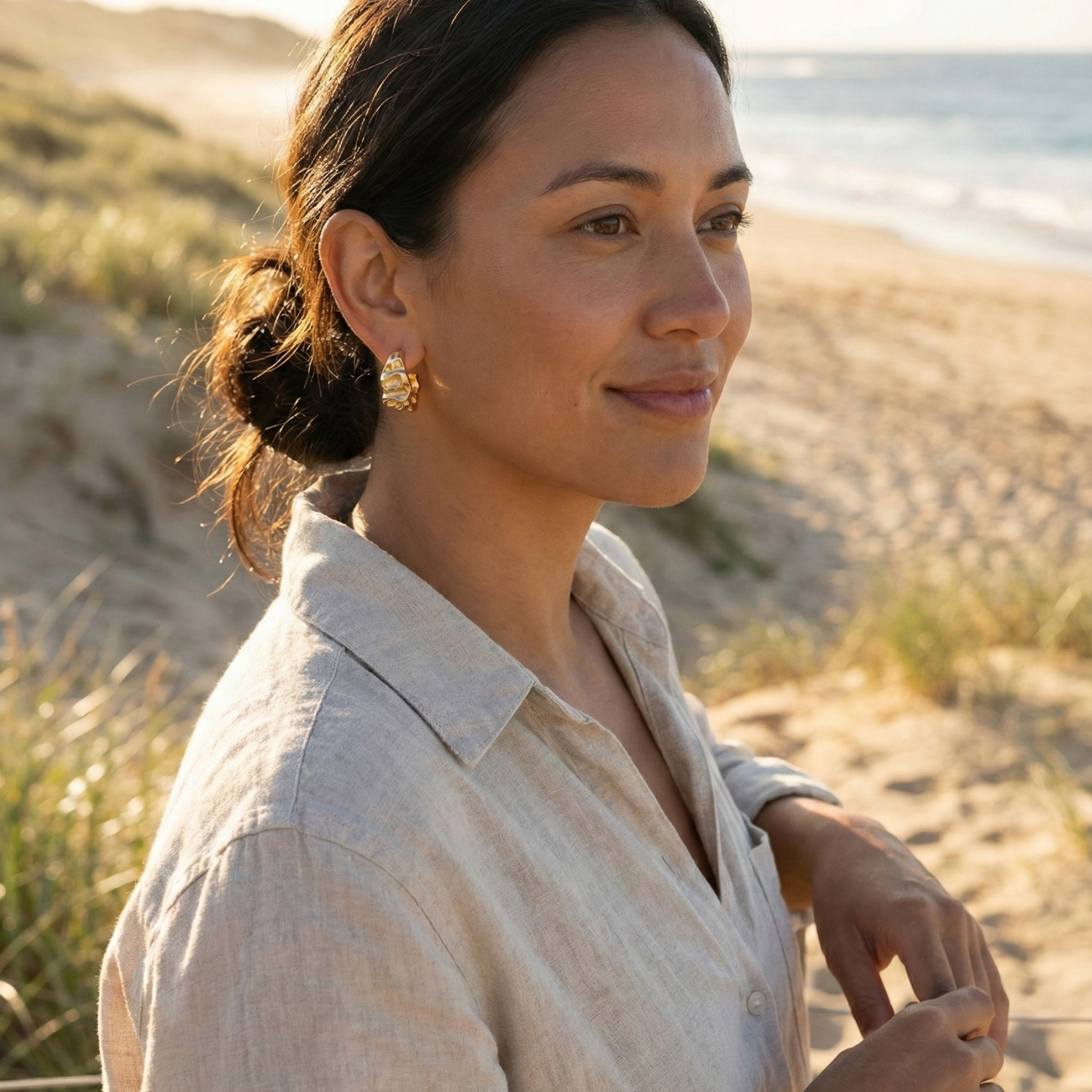 Chunky molten-textured vintage gold hoop earrings with sculpted irregular surface.