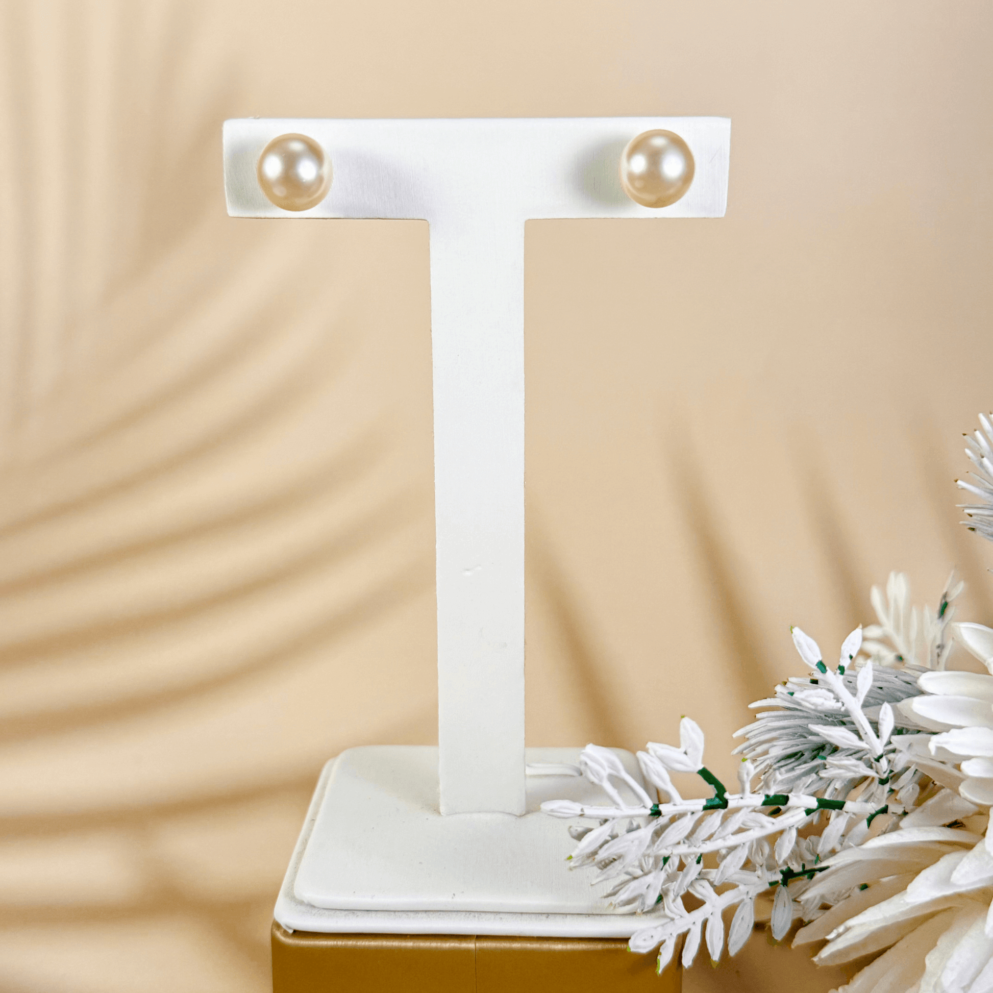 Swarovski pearl stud earrings in cream white, silver grey, and Tahitian black with gold-plated and sterling silver posts – handmade, high-quality, and available in 6mm, 8mm, 10mm sizes.