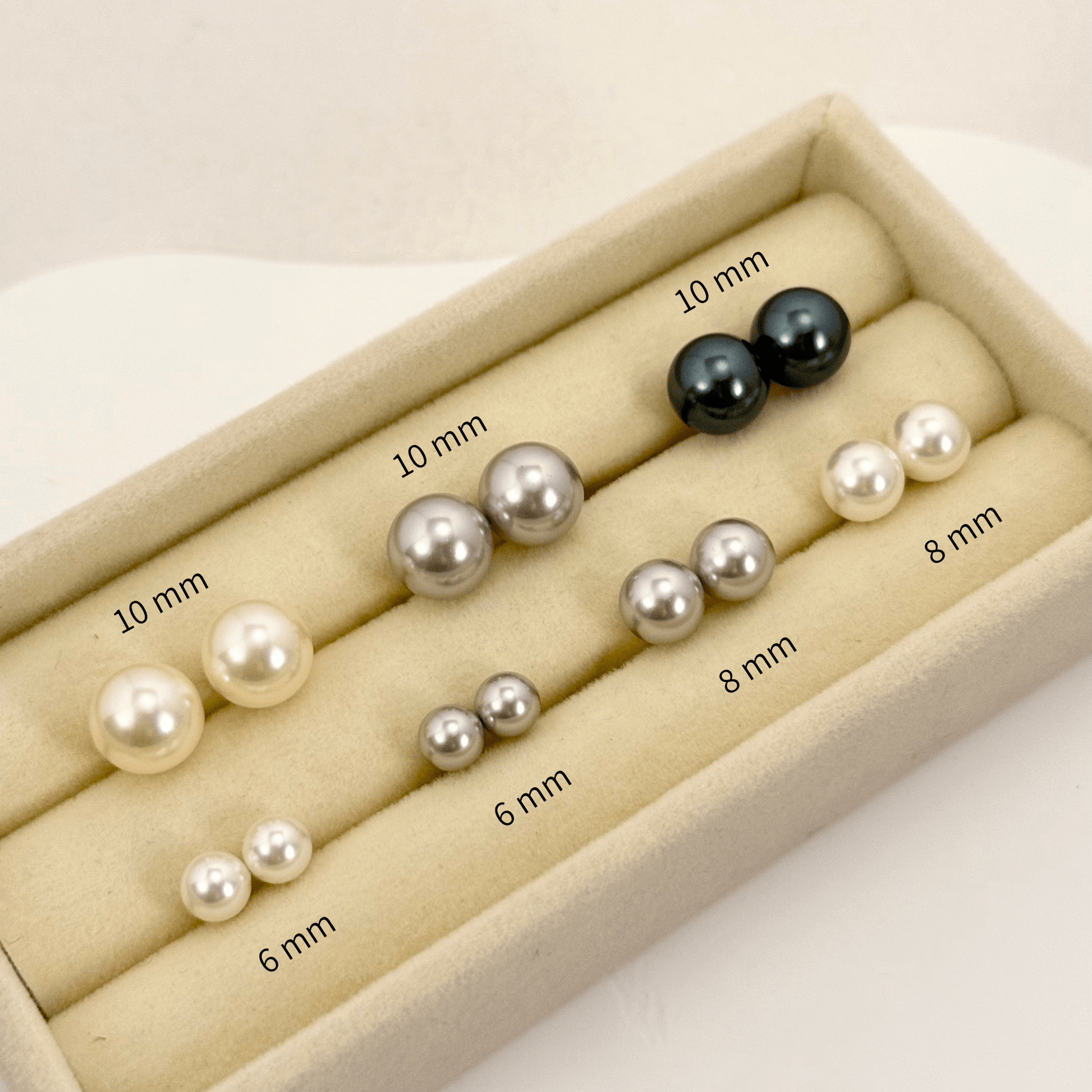 Swarovski pearl stud earrings in cream white, silver grey, and Tahitian black with gold-plated and sterling silver posts – handmade, high-quality, and available in 6mm, 8mm, 10mm sizes.