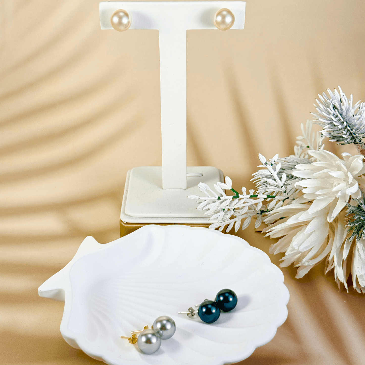 Swarovski pearl stud earrings in cream white, silver grey, and Tahitian black with gold-plated and sterling silver posts – handmade, high-quality, and available in 6mm, 8mm, 10mm sizes.