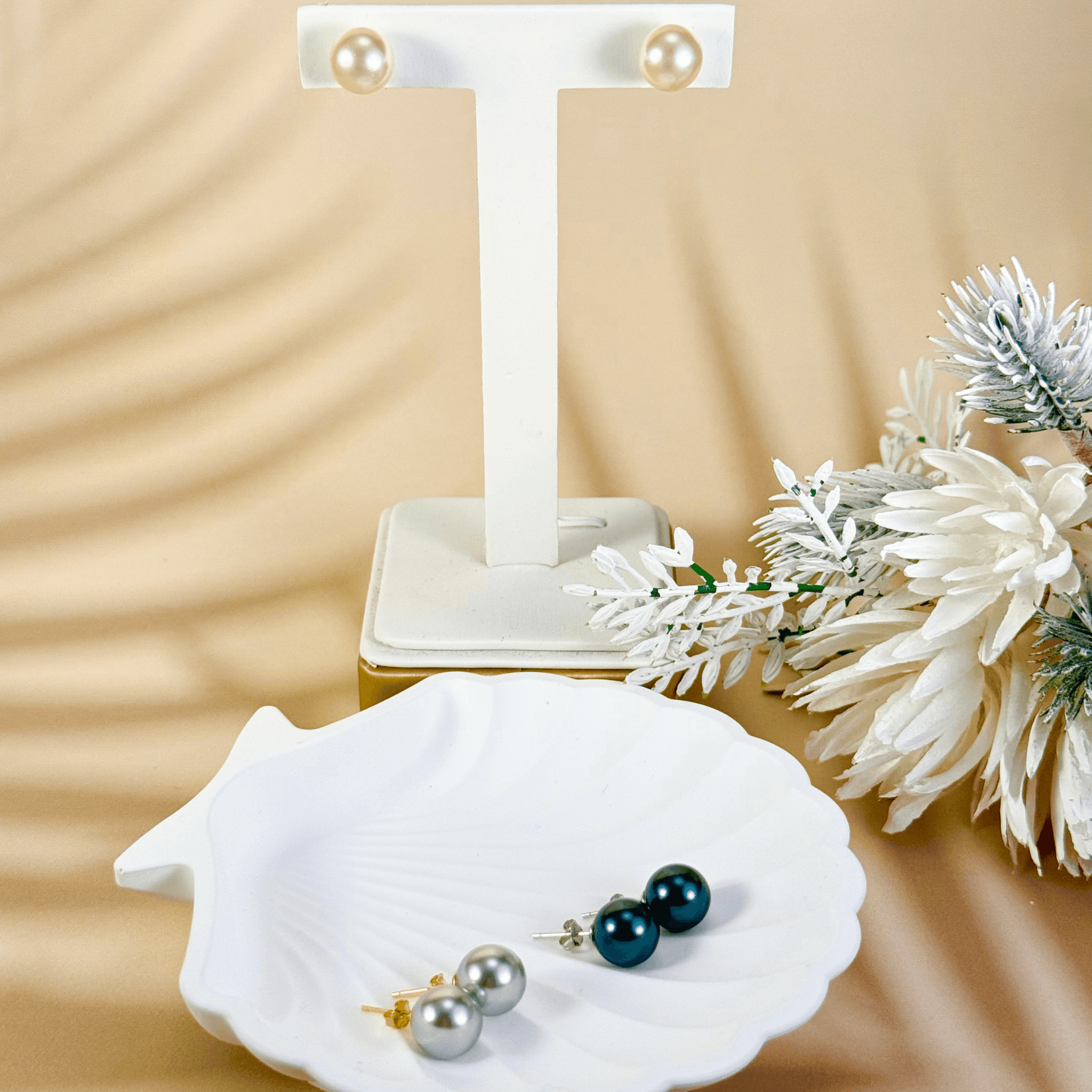 Swarovski pearl stud earrings in cream white, silver grey, and Tahitian black with gold-plated and sterling silver posts – handmade, high-quality, and available in 6mm, 8mm, 10mm sizes.