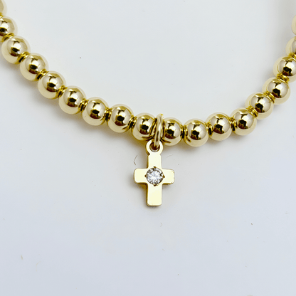 Cross charm gold bead bracelet with crystal detail and polished gold-filled beads – MXW Jewellery