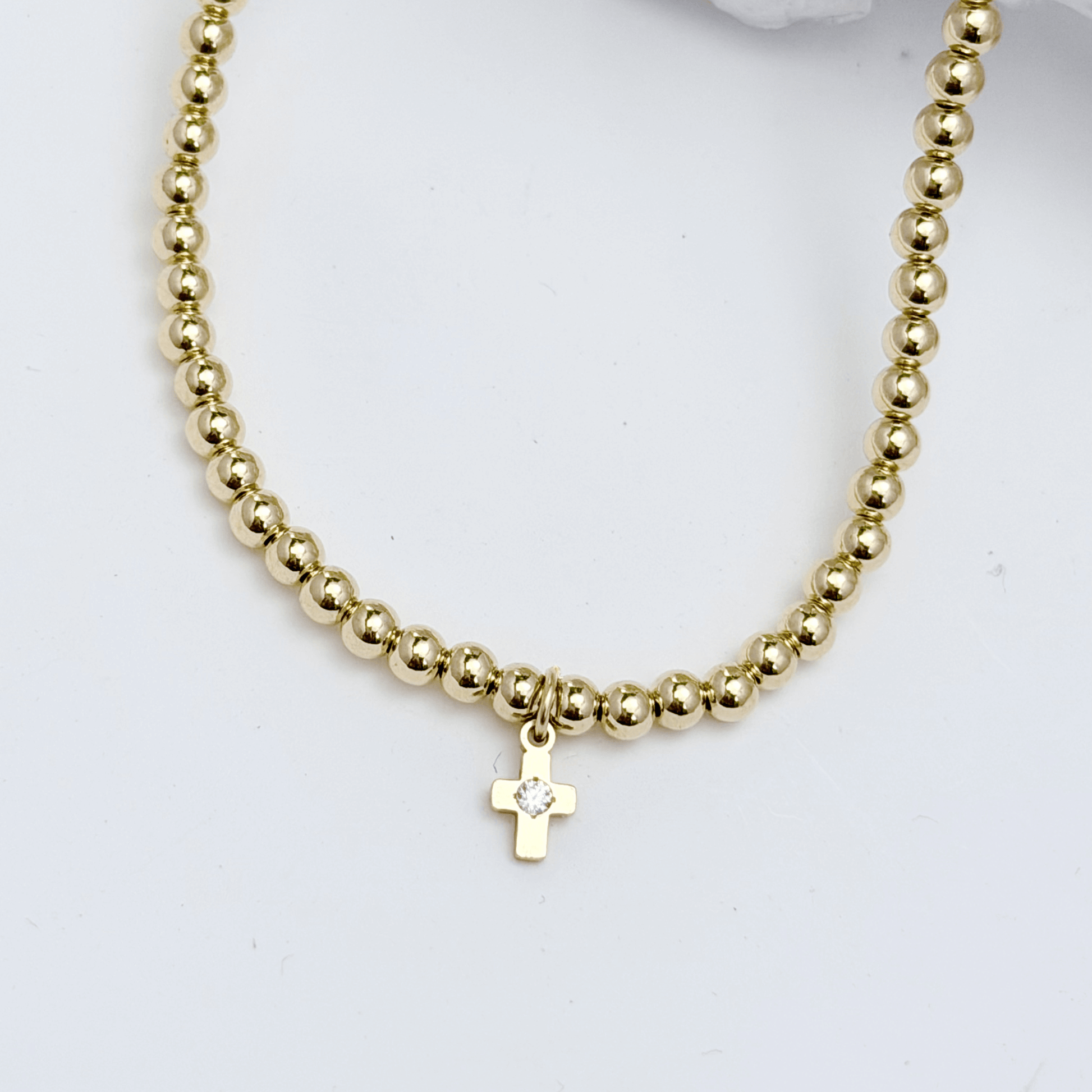 Cross charm gold bead bracelet with crystal detail and polished gold-filled beads – MXW Jewellery
