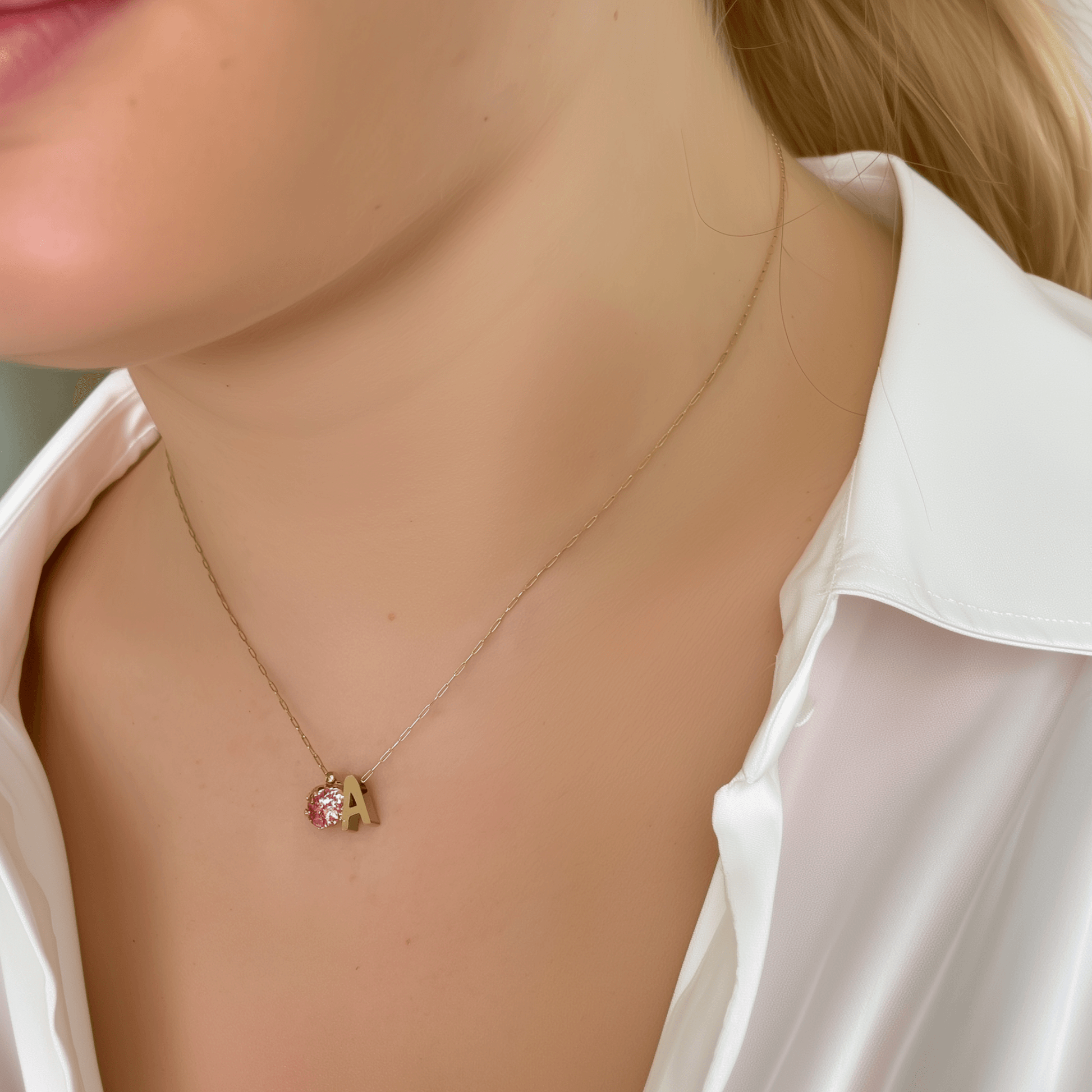 Personalized initial necklace featuring a Swarovski crystal charm on a delicate 1 mm chain, in gold and silver, hypoallergenic and tarnish-resistant.