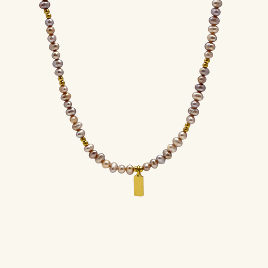 Custom purple pearl necklace with engravable charm in gold or silver – waterproof personalised jewellery.
