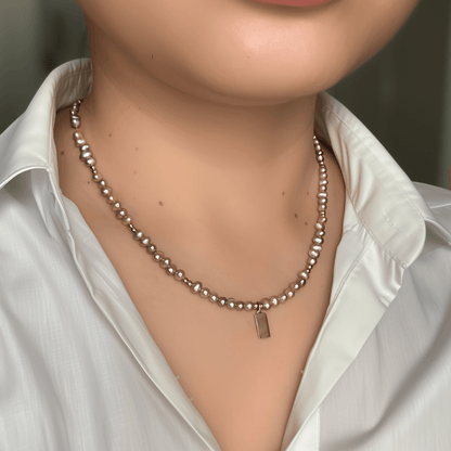 Custom purple pearl necklace with engravable charm in gold or silver – waterproof personalised jewellery.