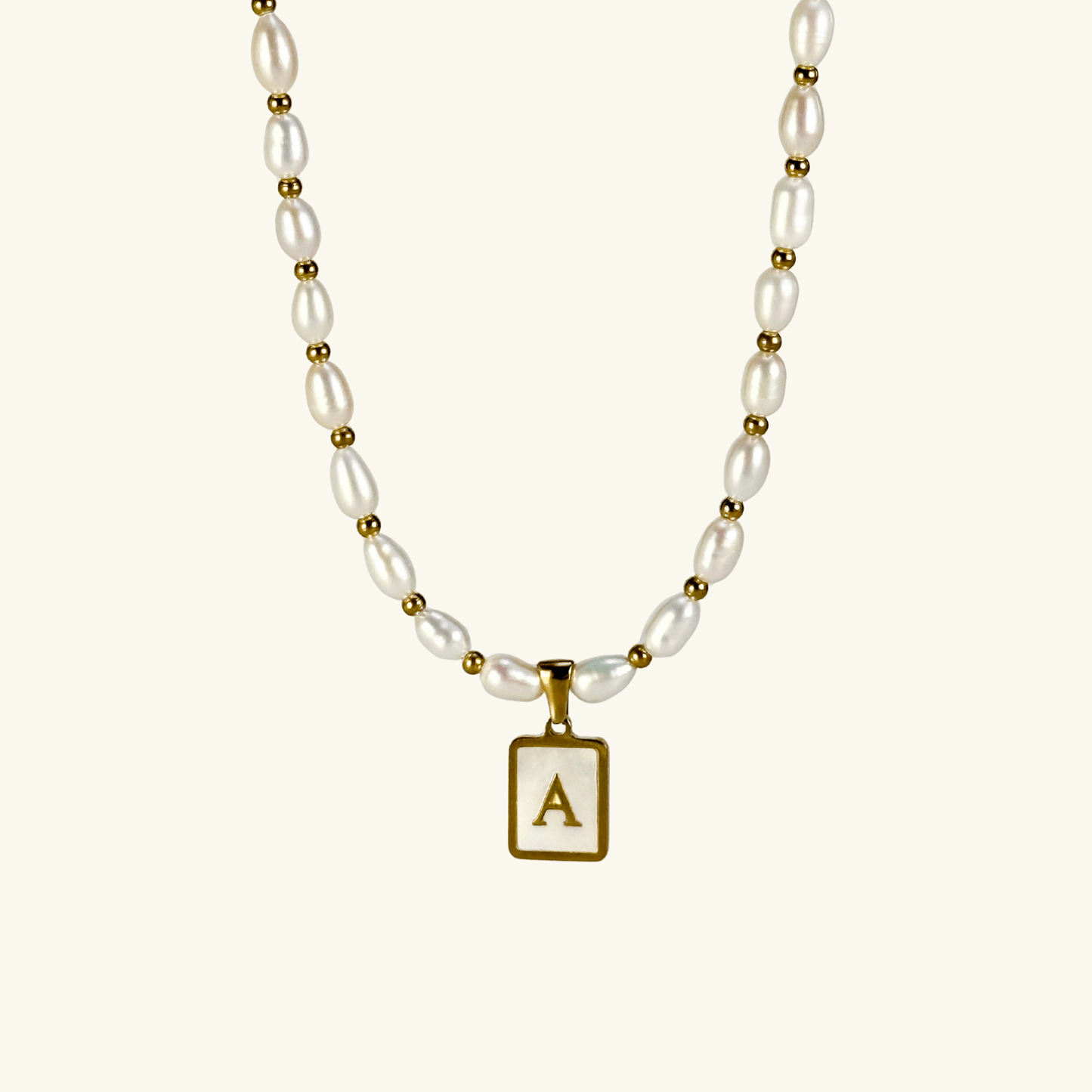 Custom freshwater pearl necklace with gold shell initial pendant