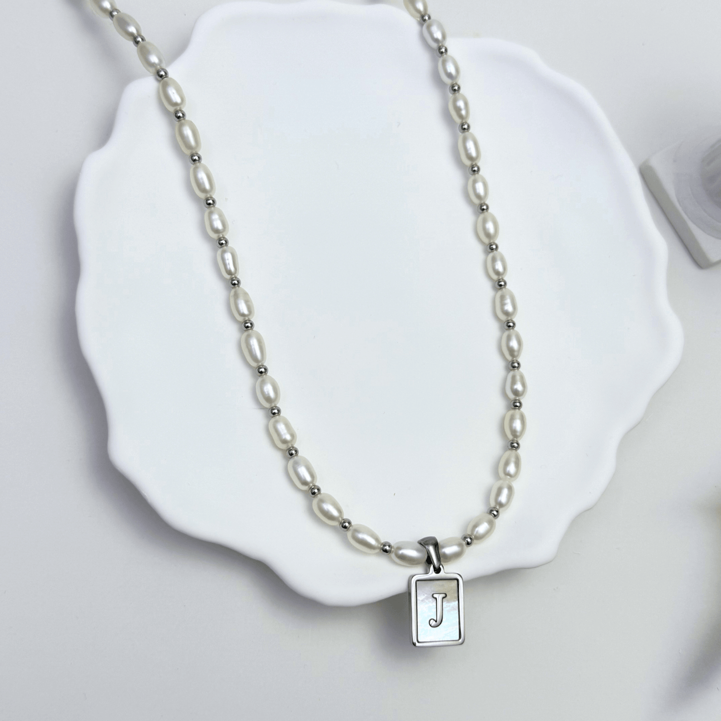 Custom freshwater pearl necklace with silver shell initial pendant