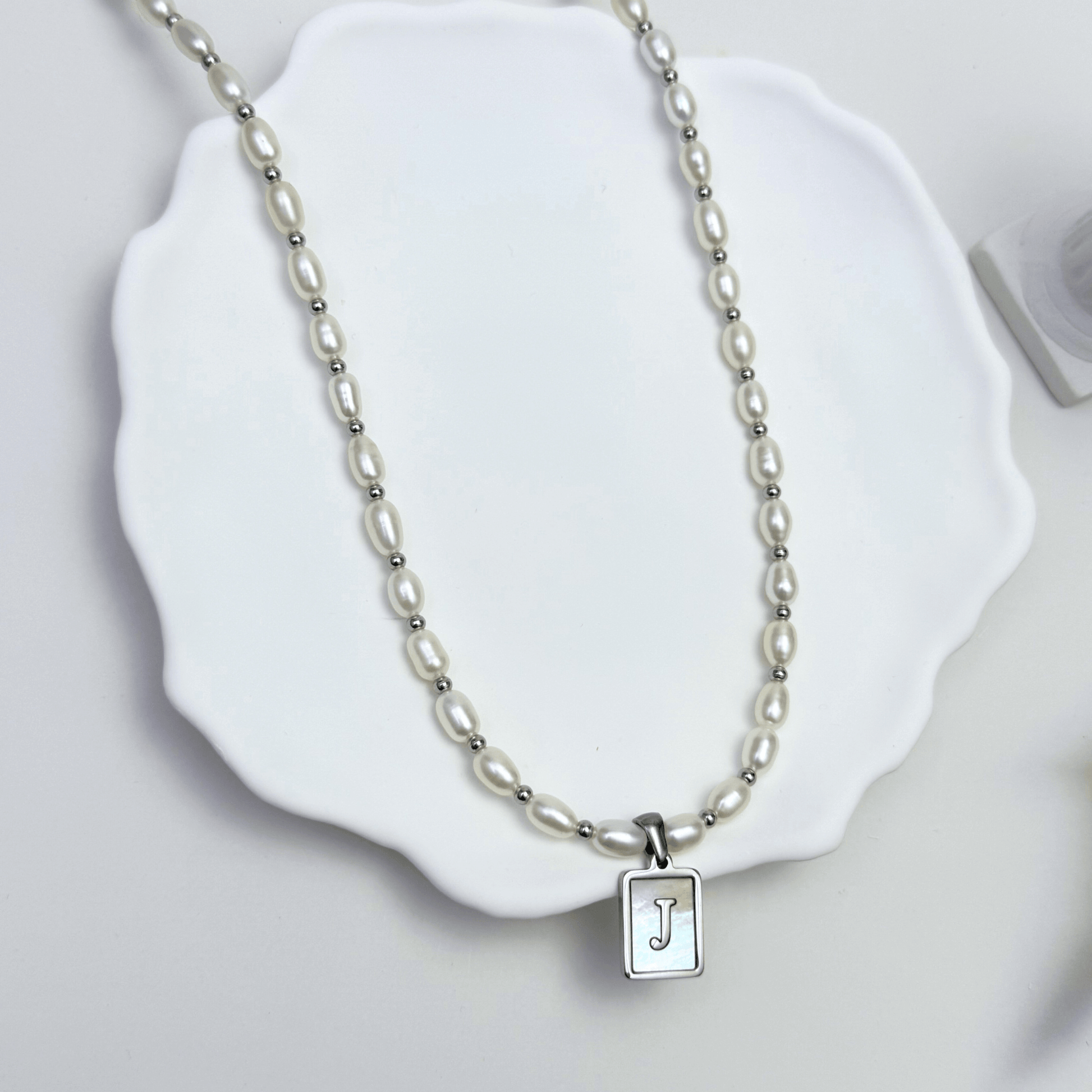Custom freshwater pearl necklace with silver shell initial pendant