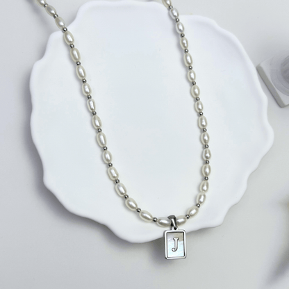 Custom freshwater pearl necklace with silver shell initial pendant