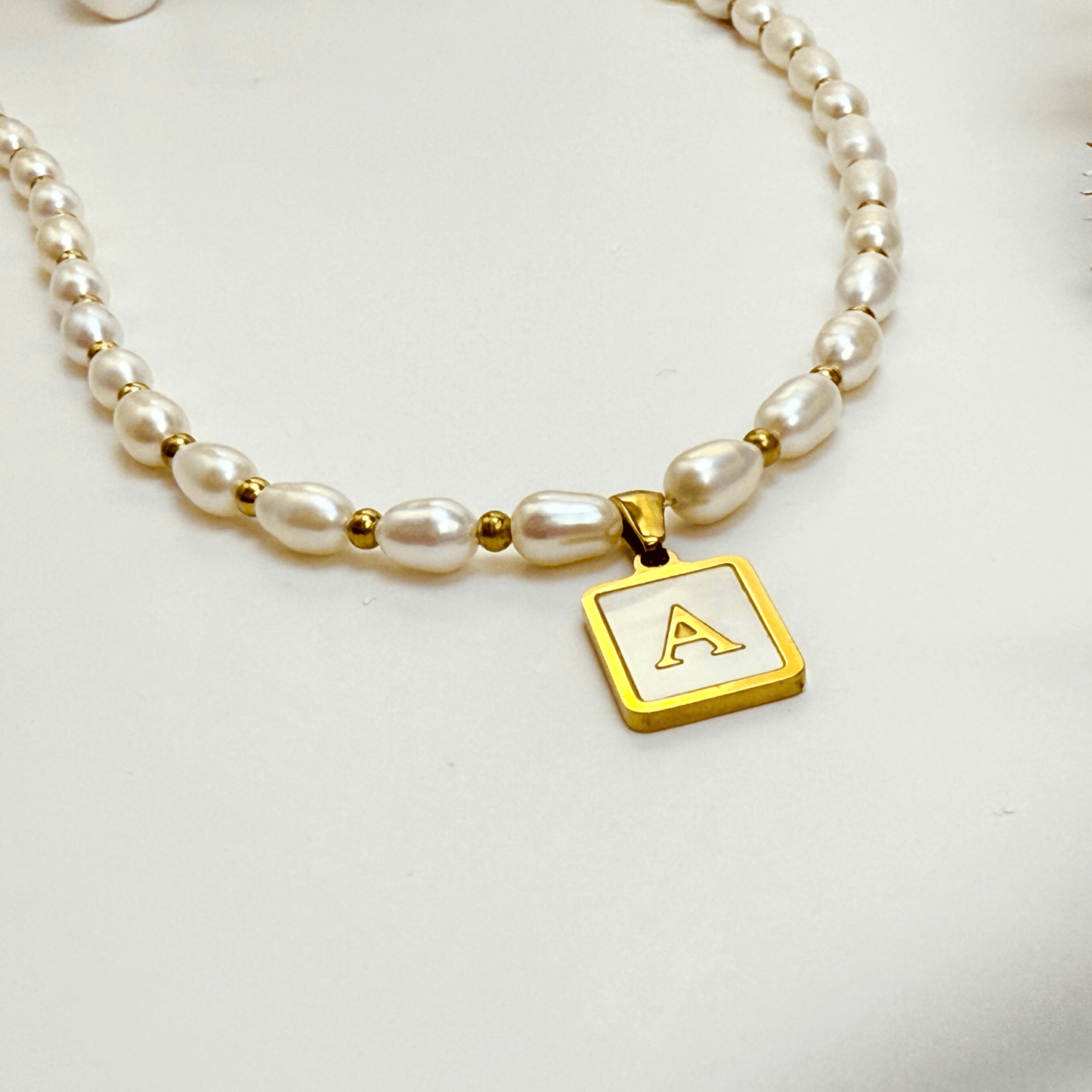 Custom freshwater pearl necklace with gold shell initial pendant