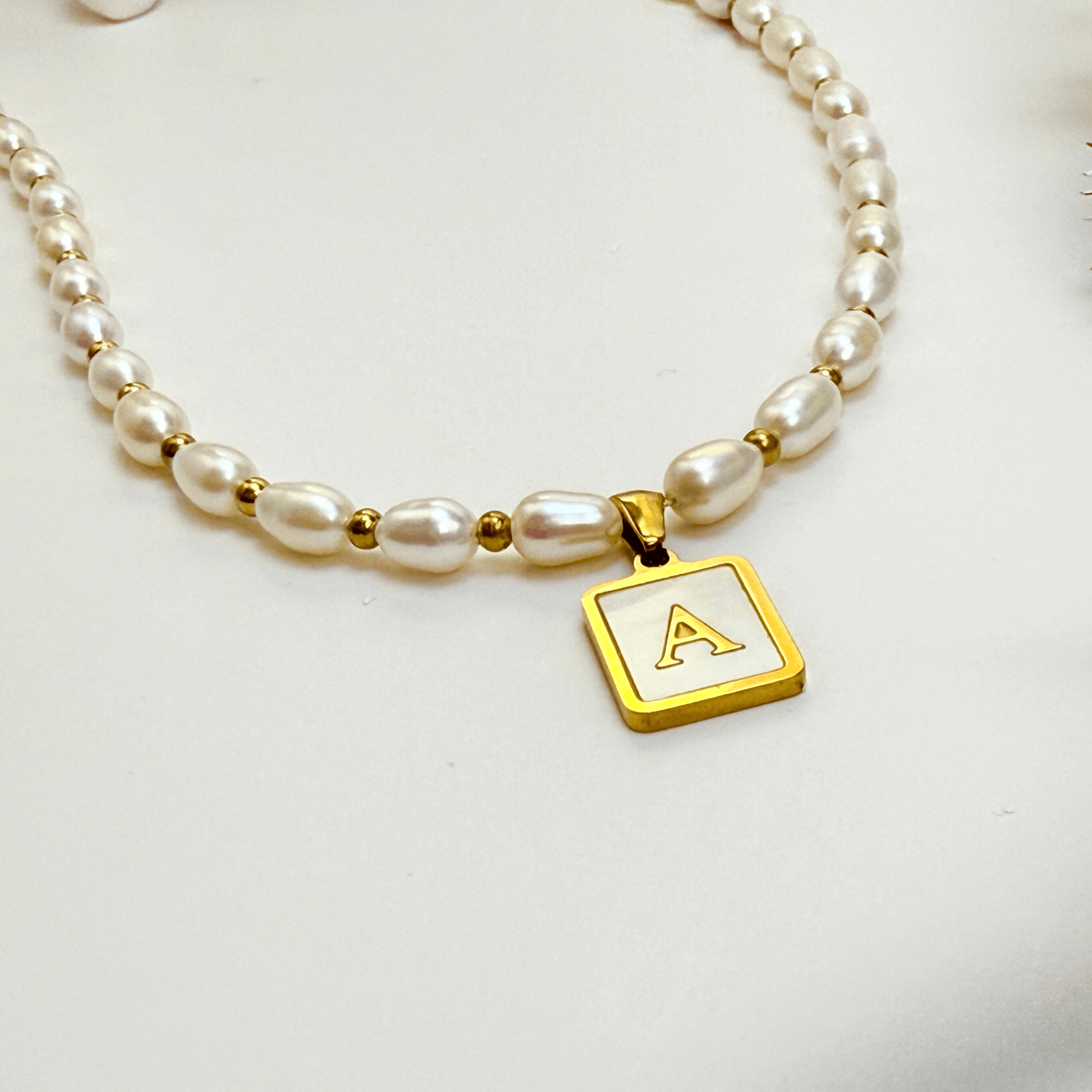 Custom freshwater pearl necklace with gold shell initial pendant