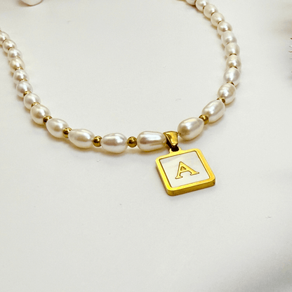 Custom freshwater pearl necklace with gold shell initial pendant