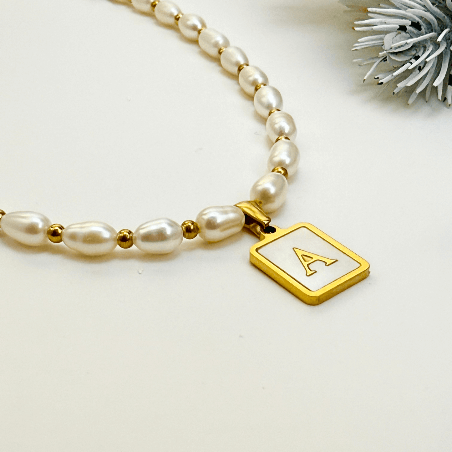 Custom freshwater pearl necklace with gold shell initial pendant