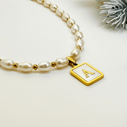 Custom freshwater pearl necklace with gold shell initial pendant