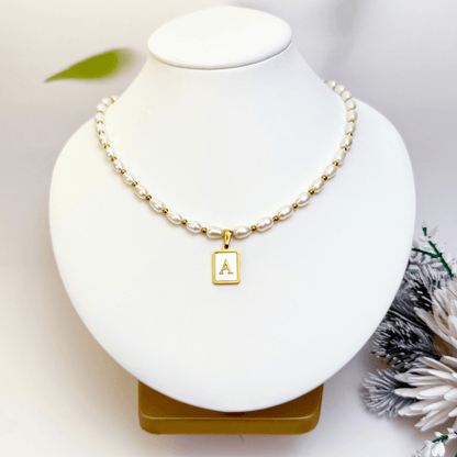 Custom freshwater pearl necklace with gold shell initial pendant