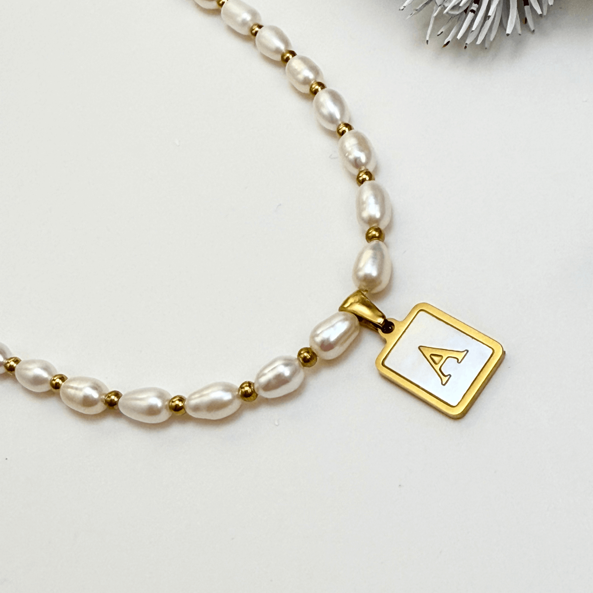Custom freshwater pearl necklace with gold shell initial pendant