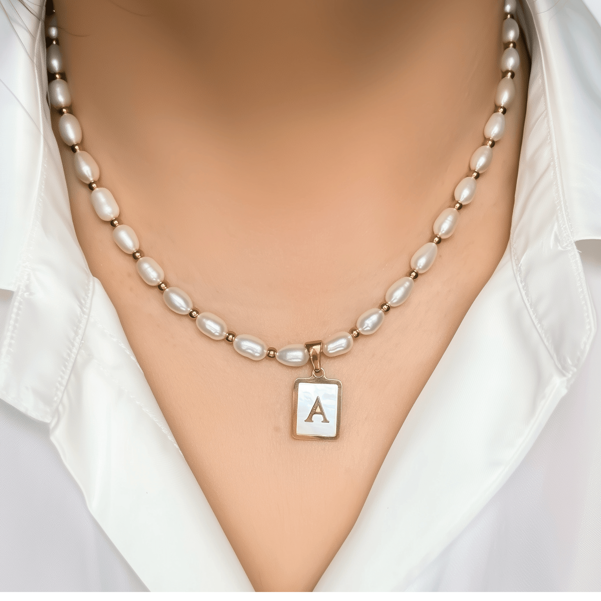 Custom freshwater pearl necklace with gold shell initial pendant