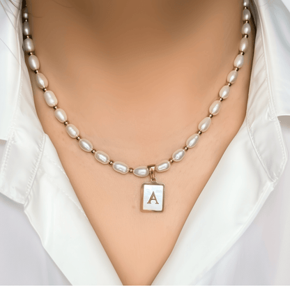 Custom freshwater pearl necklace with gold shell initial pendant