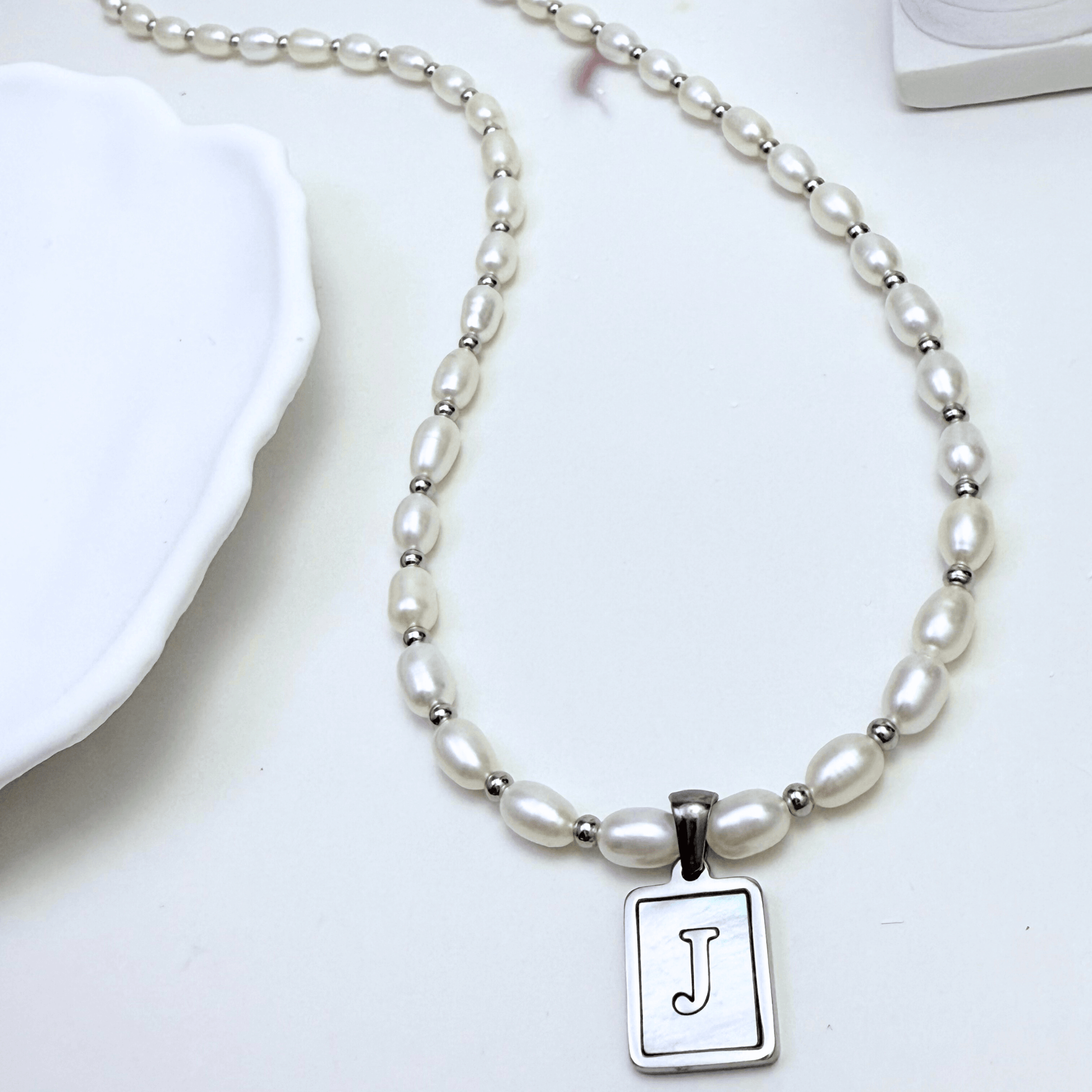 Custom freshwater pearl necklace with silver shell initial pendant