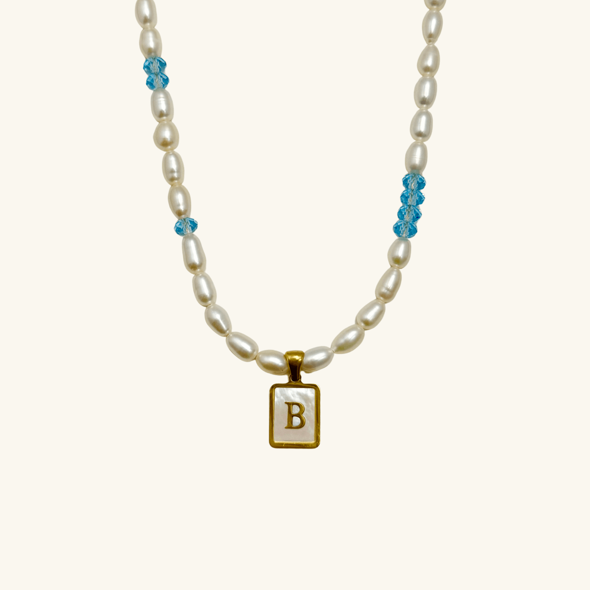 Custom freshwater pearl necklace with Swarovski birthstone and shell initial charm