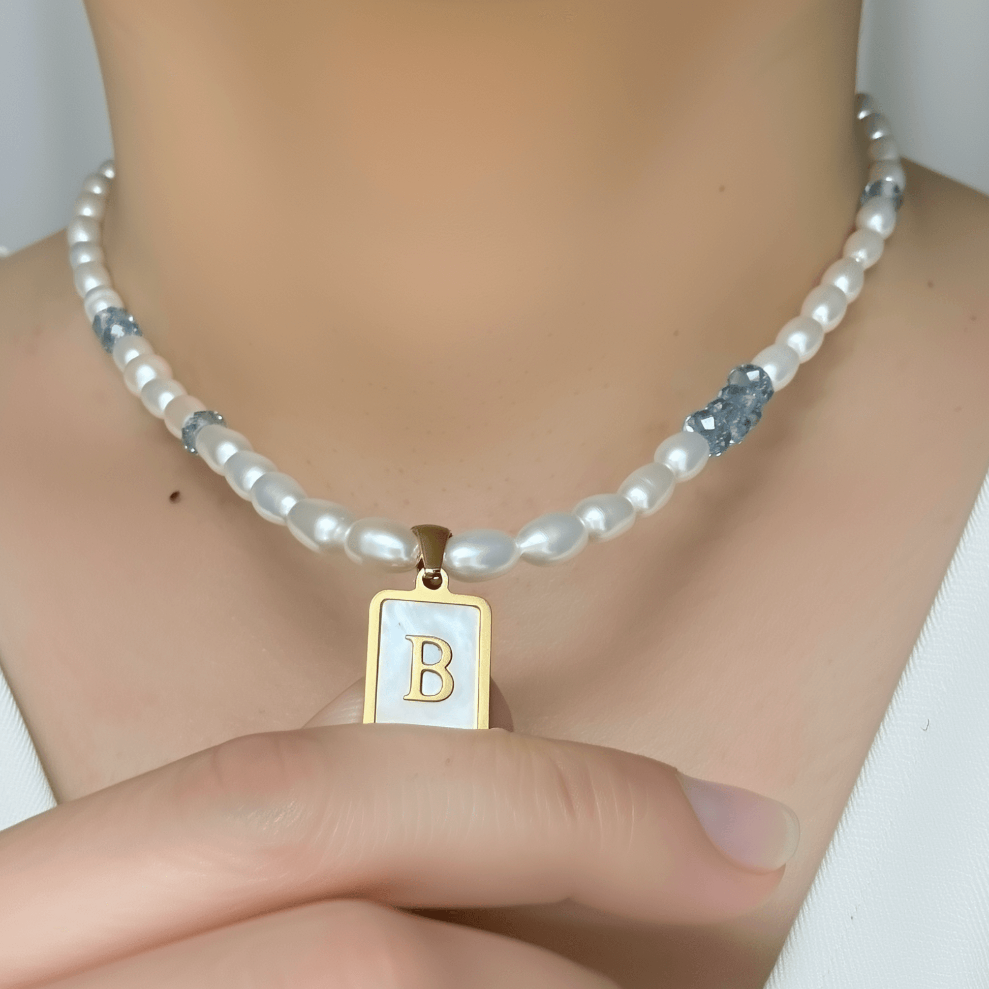 Custom freshwater pearl necklace with Swarovski birthstone and shell initial charm