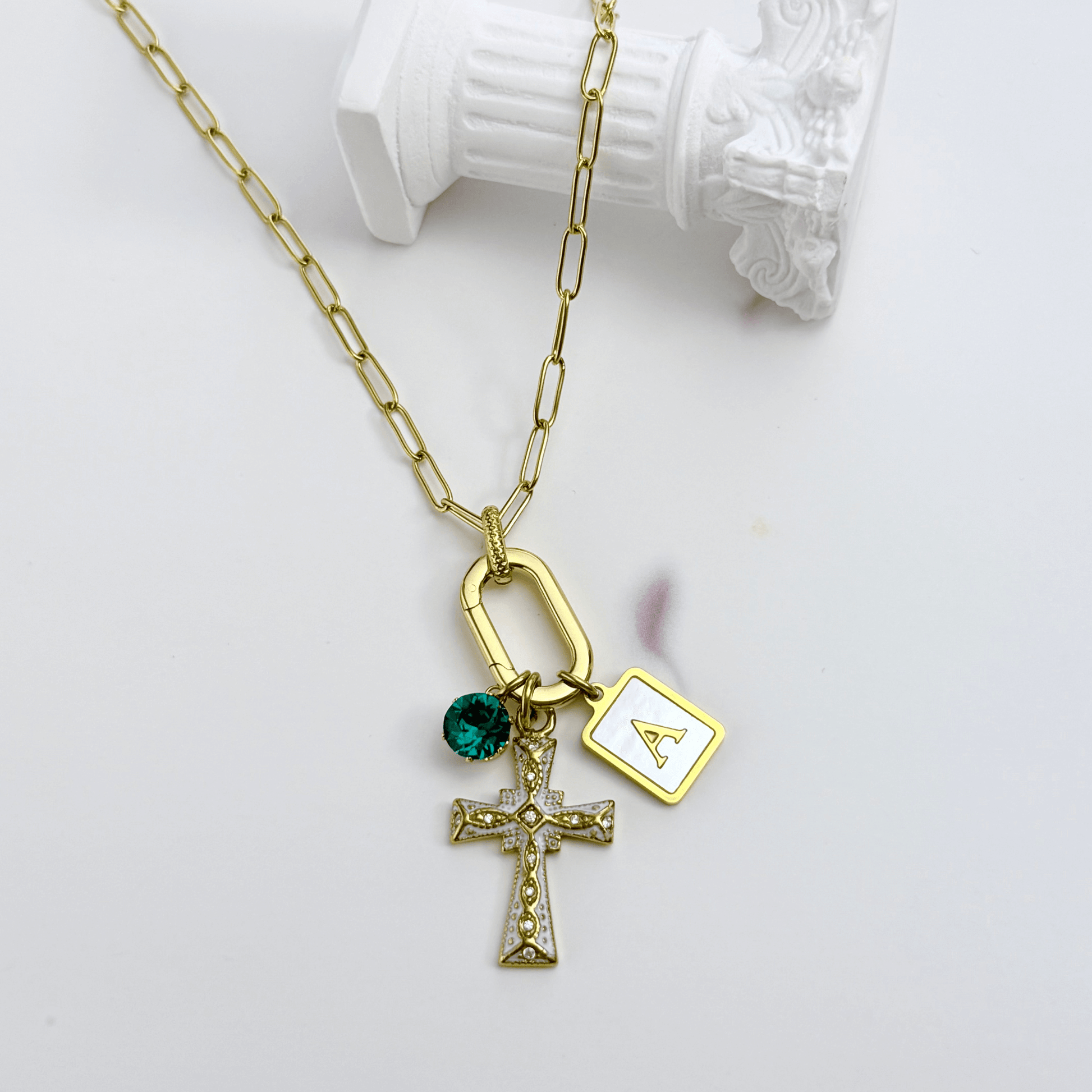 Custom openable link necklace with gold cross pendant, shell initial charm, and teal birthstone made with Swarovski® element on waterproof chain