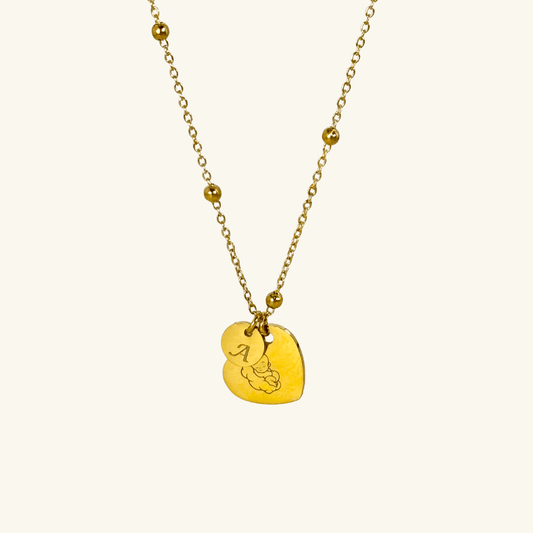 Personalised heart necklace with engraved initial charms