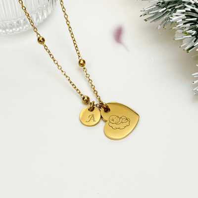 Personalised heart necklace with engraved initial charms