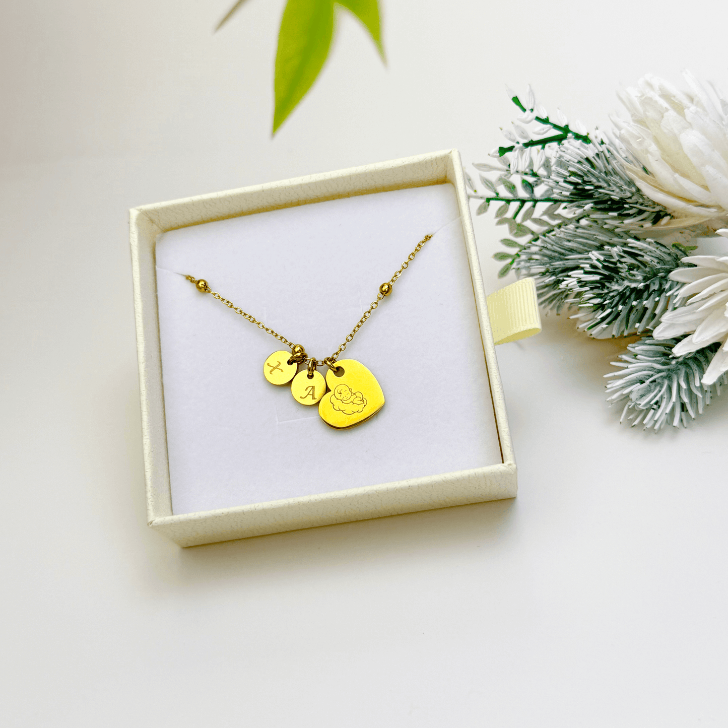 Personalised heart necklace with engraved initial charms