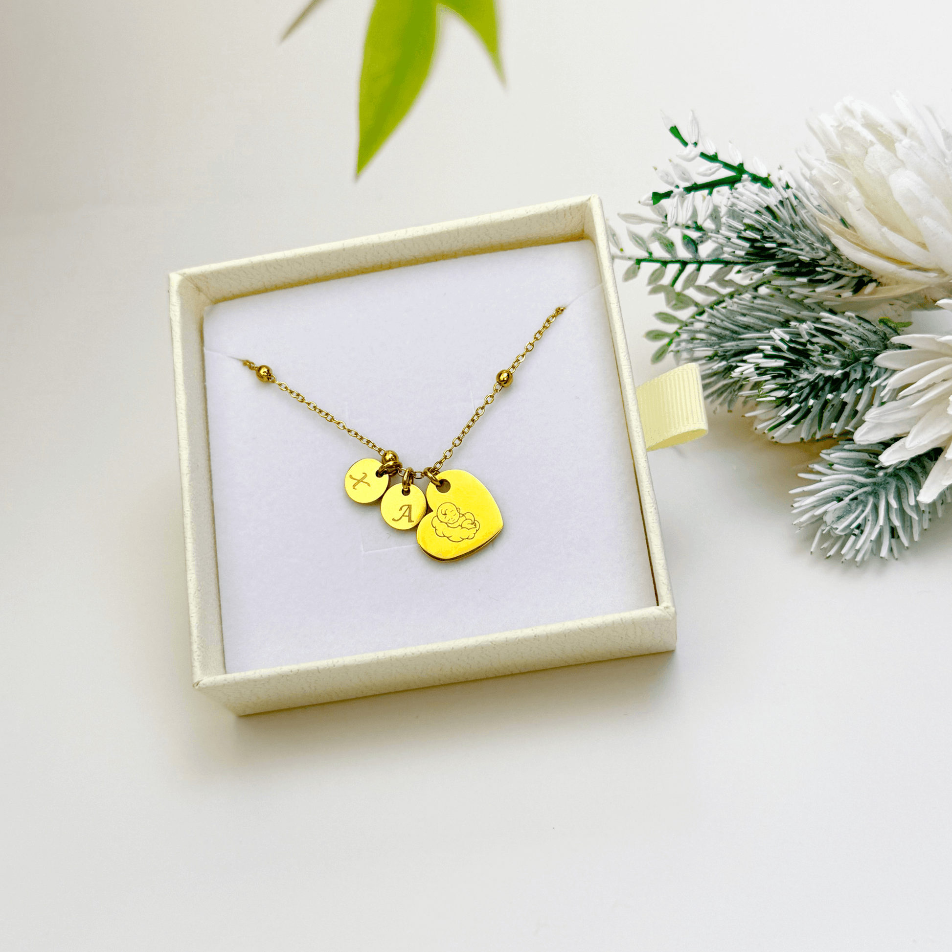 Personalised heart necklace with engraved initial charms