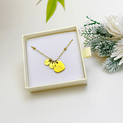 Personalised heart necklace with engraved initial charms