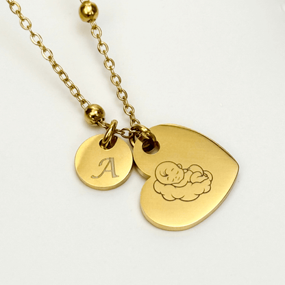 Personalised heart necklace with engraved initial charms