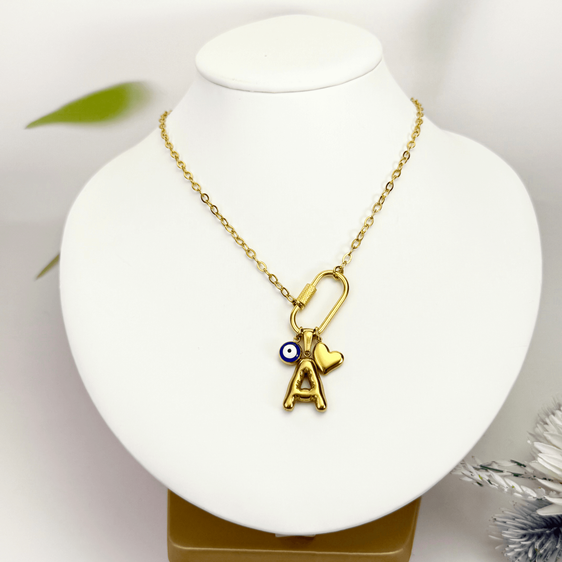 Custom rectangular ring necklace with detachable charms – initial, evil eye, and heart for love and protection.