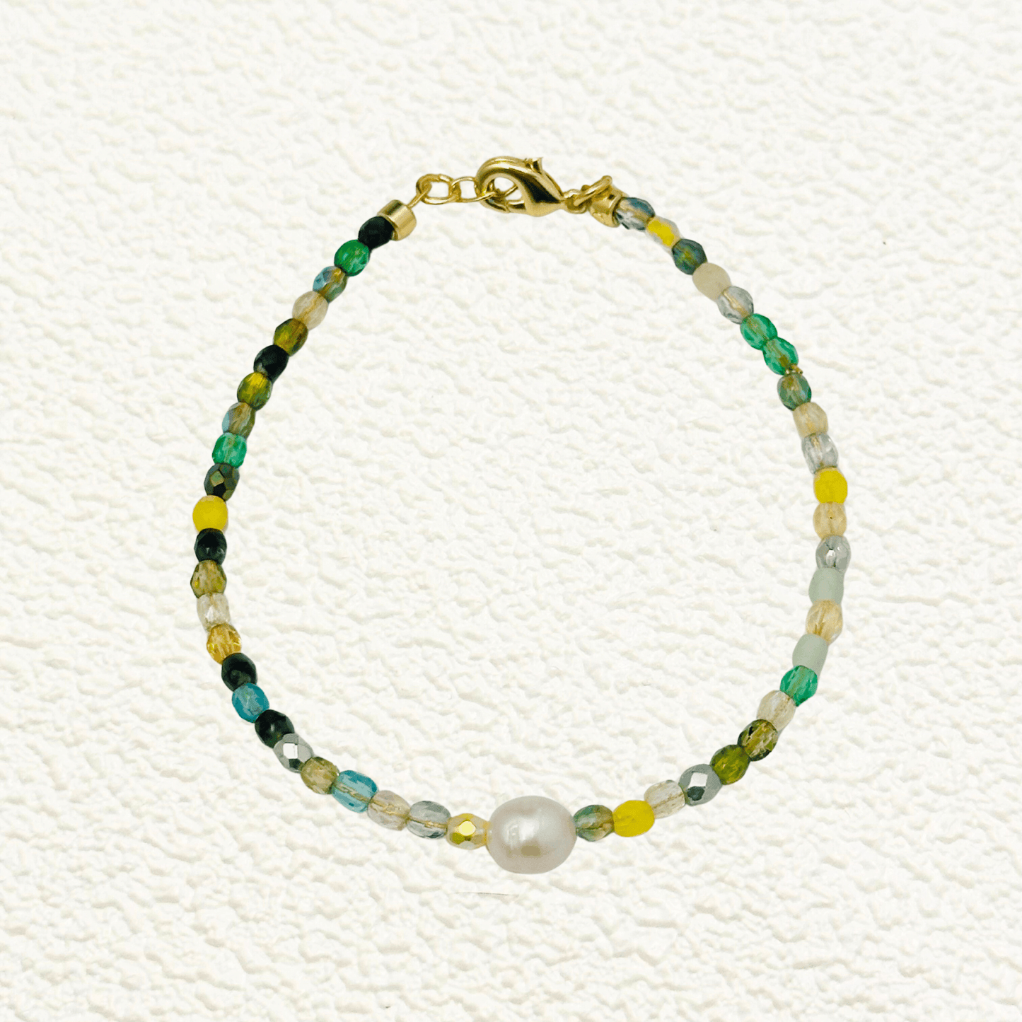 Handmade Czech crystal beaded bracelet or anklet with pearl accent, crafted with 3mm and 4mm fire-polished Czech beads in a variety of colors, customisable for a unique style.