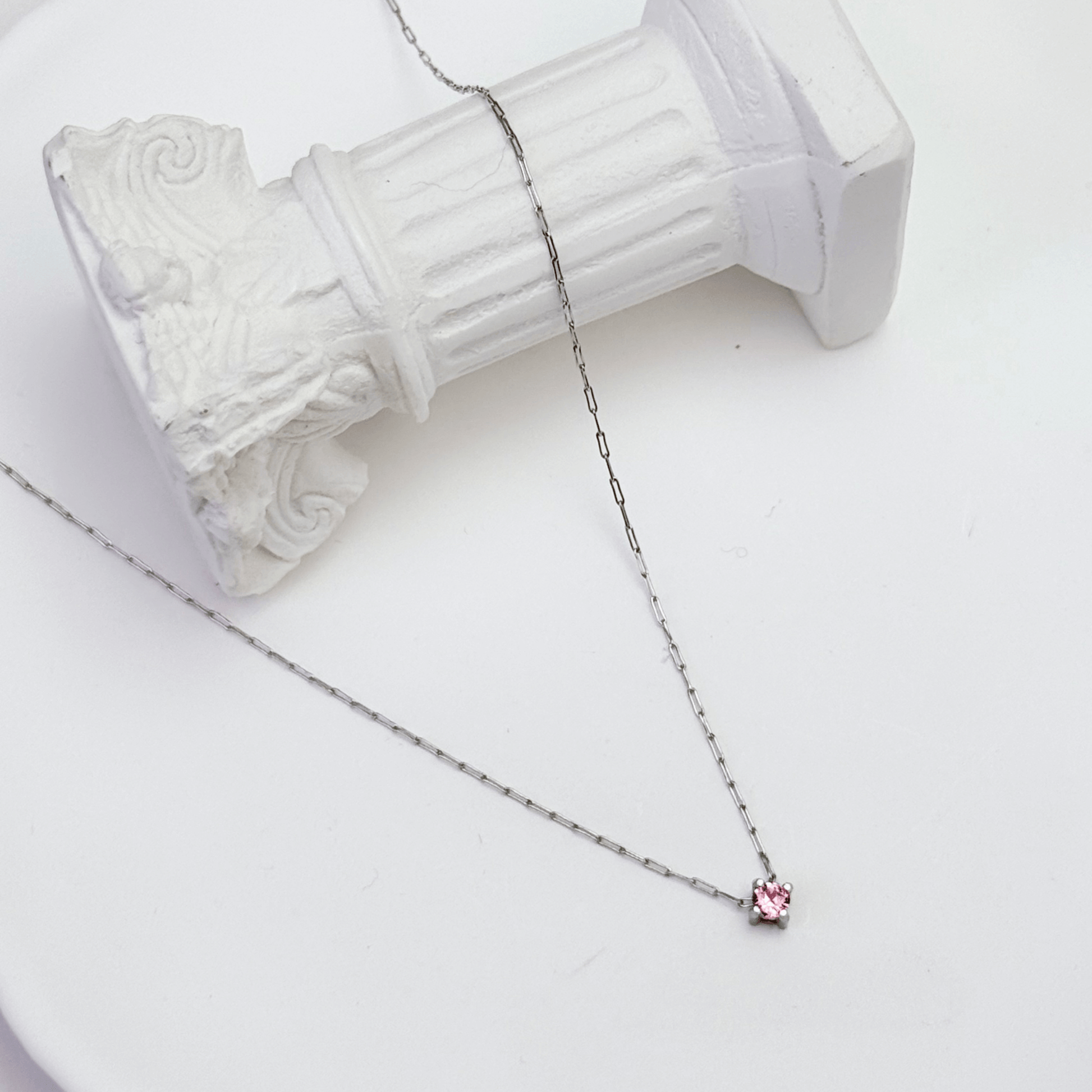 Dainty gold birthstone necklace with sparkling Swarovski element, minimalist and elegant design for everyday wear