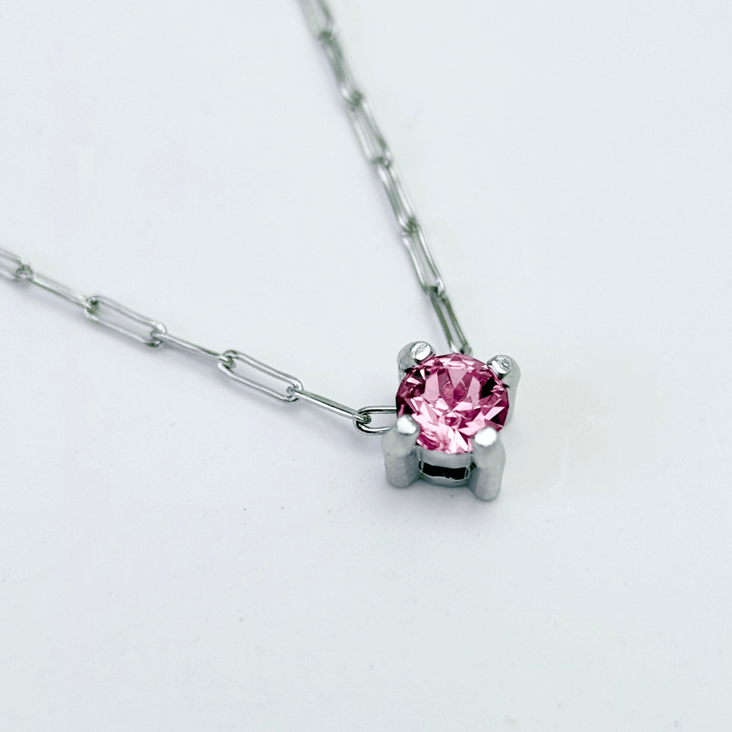Dainty gold birthstone necklace with sparkling Swarovski element, minimalist and elegant design for everyday wear