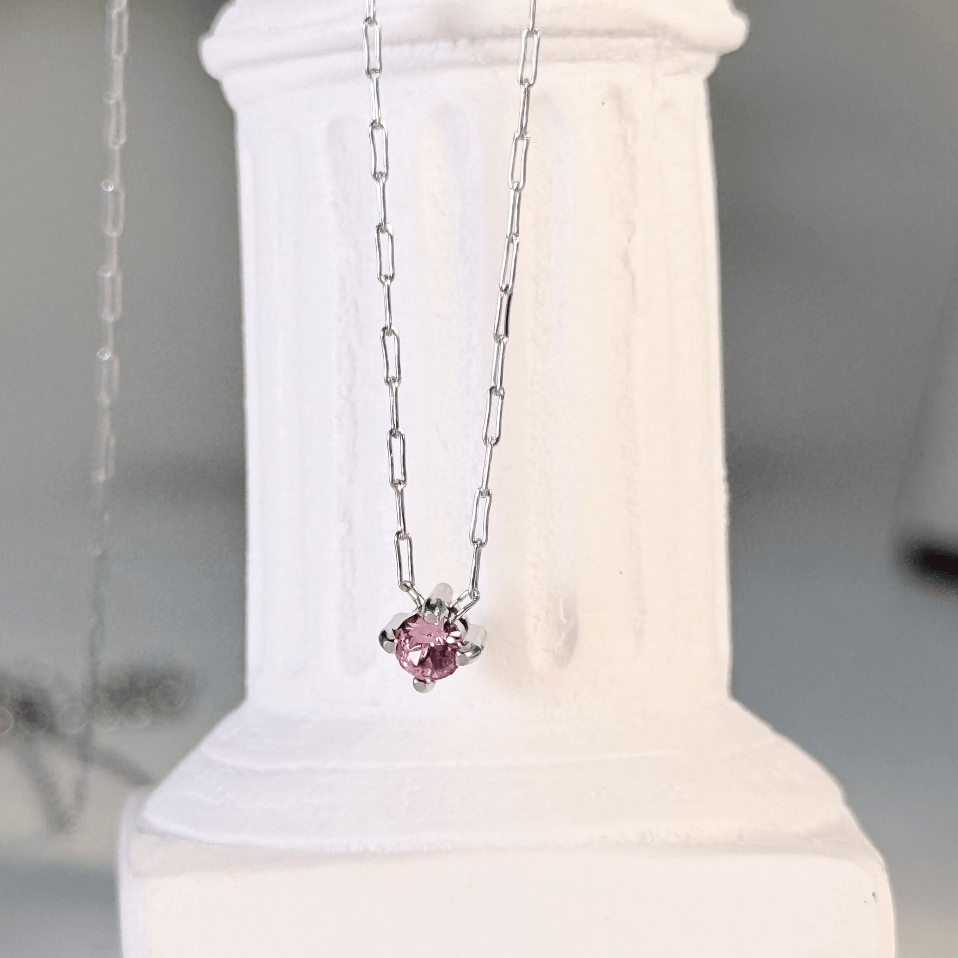 Dainty gold birthstone necklace with sparkling Swarovski element, minimalist and elegant design for everyday wear